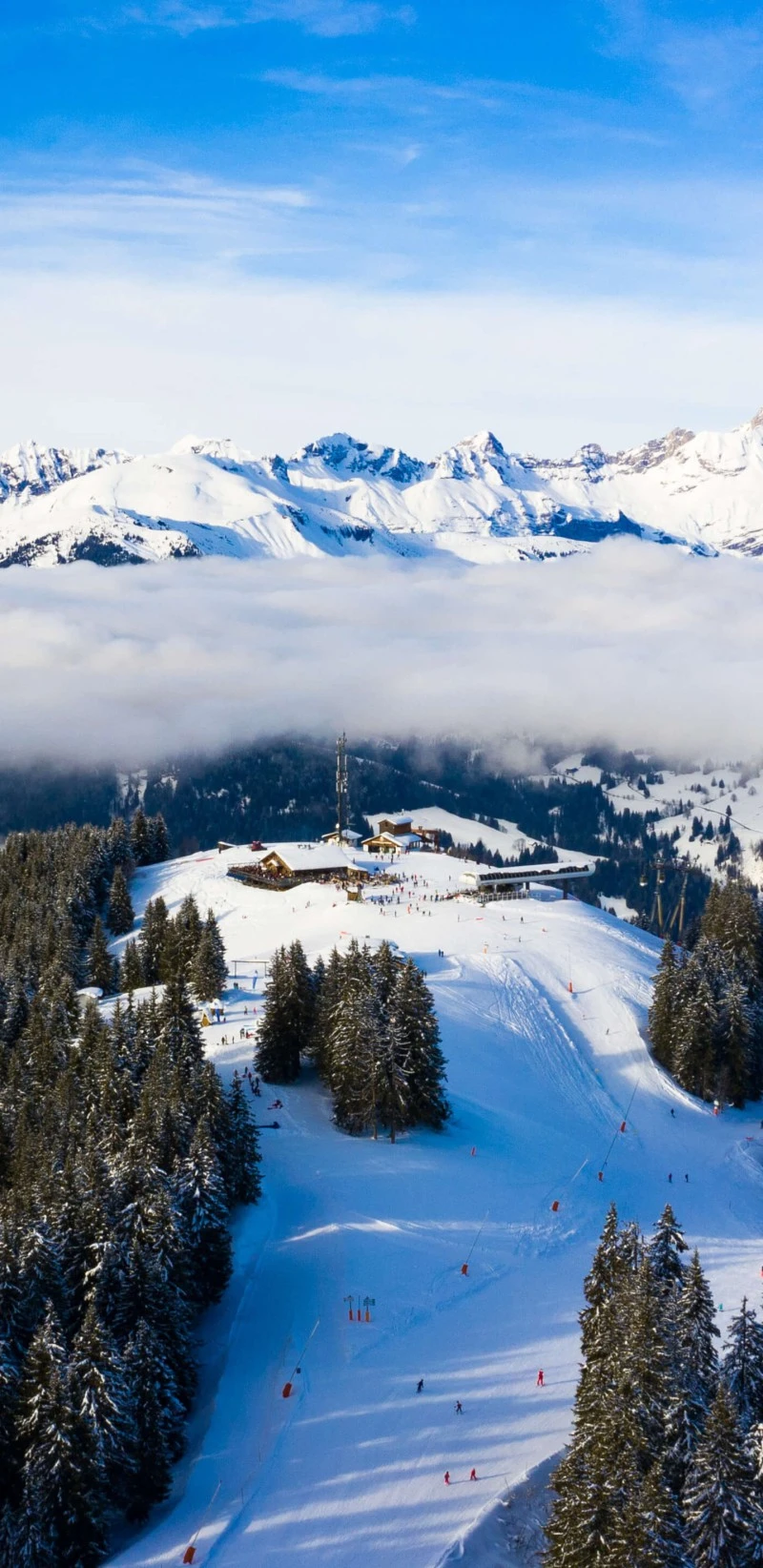 Aerial View of a Snowy Mountain Resort 4K Mobile Wallpaper