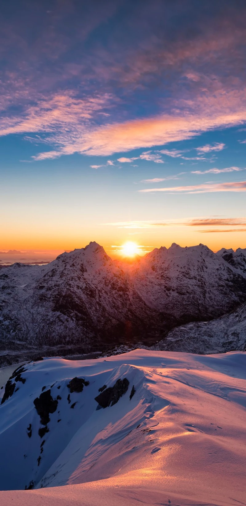 Sunset over Snowy Mountains 4K Mobile Wallpaper