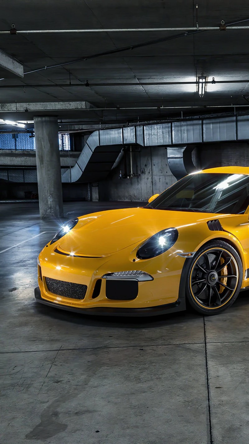Yellow Porsche 911 GT3 in Parking Garage 4K Mobile Wallpaper