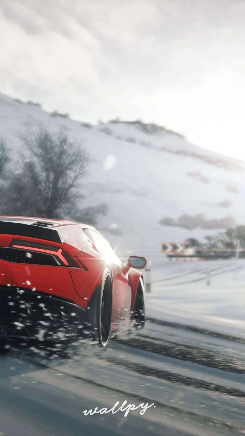 Red Lamborghini Huracán in Snowy Landscape 4K Mobile Wallpaper