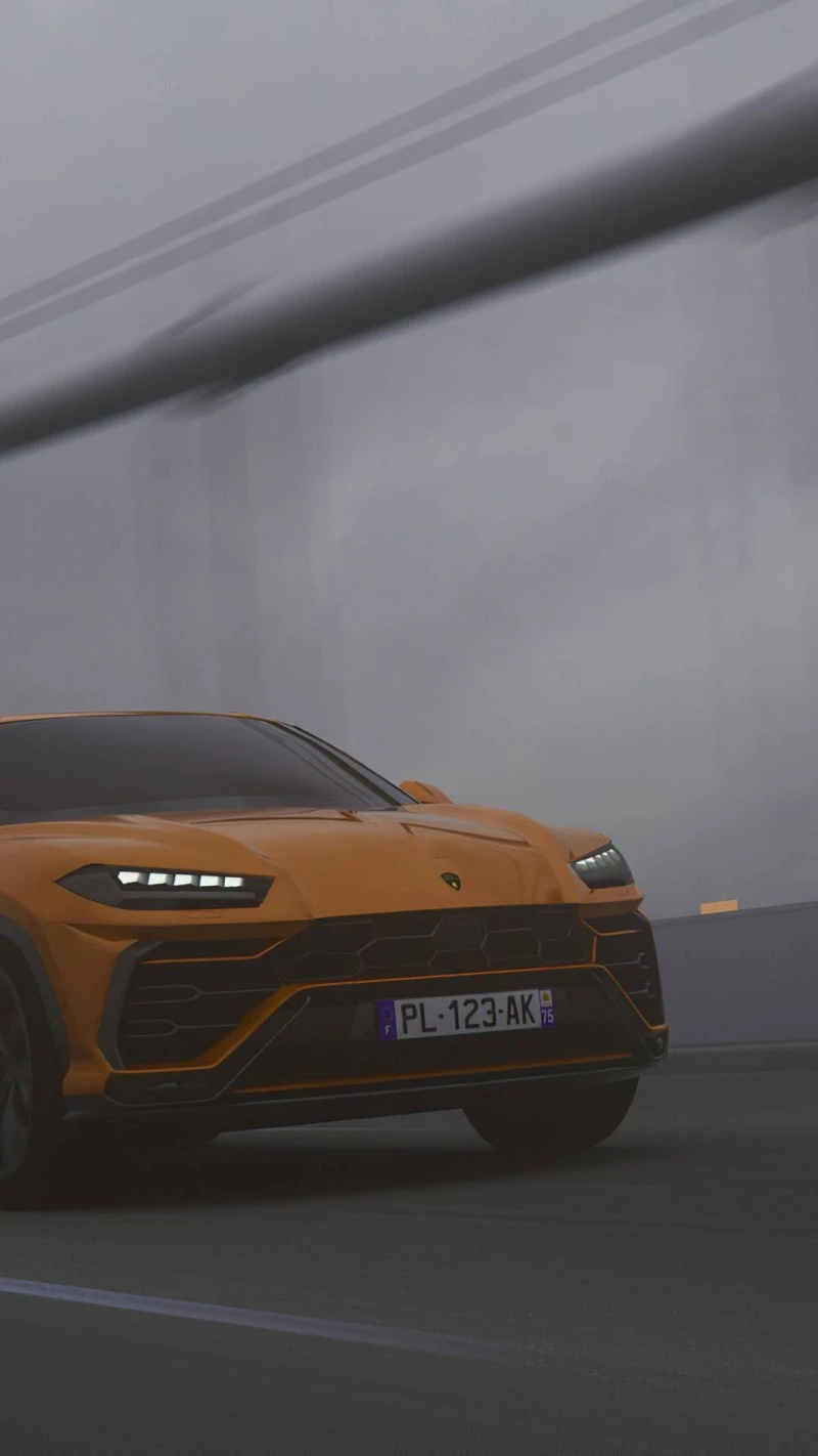 Orange Lamborghini Urus in Motion 4K Mobile Wallpaper