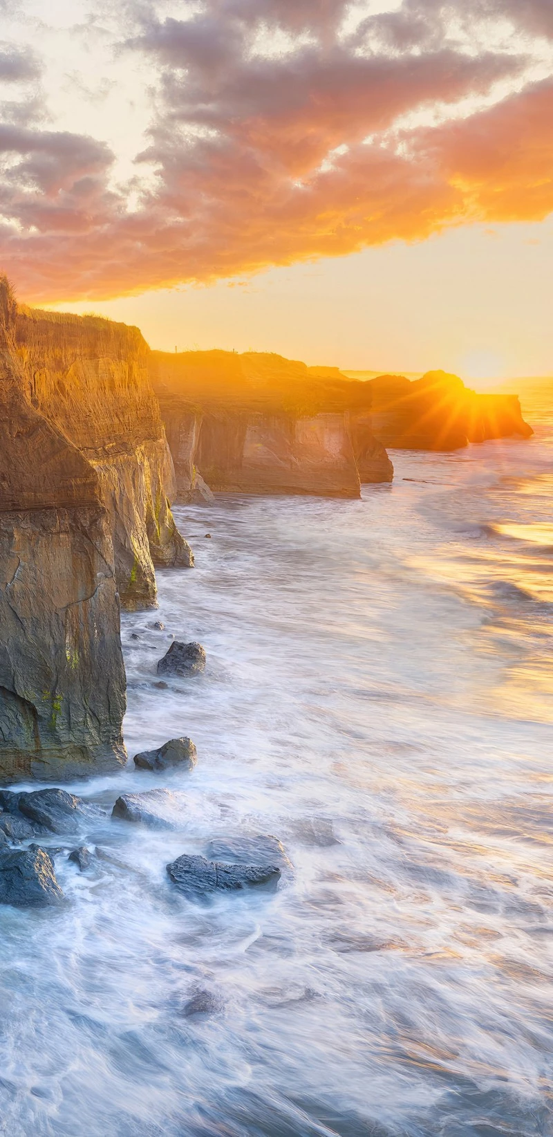 Sunset over the Coastal Cliffs 4K Mobile Wallpaper