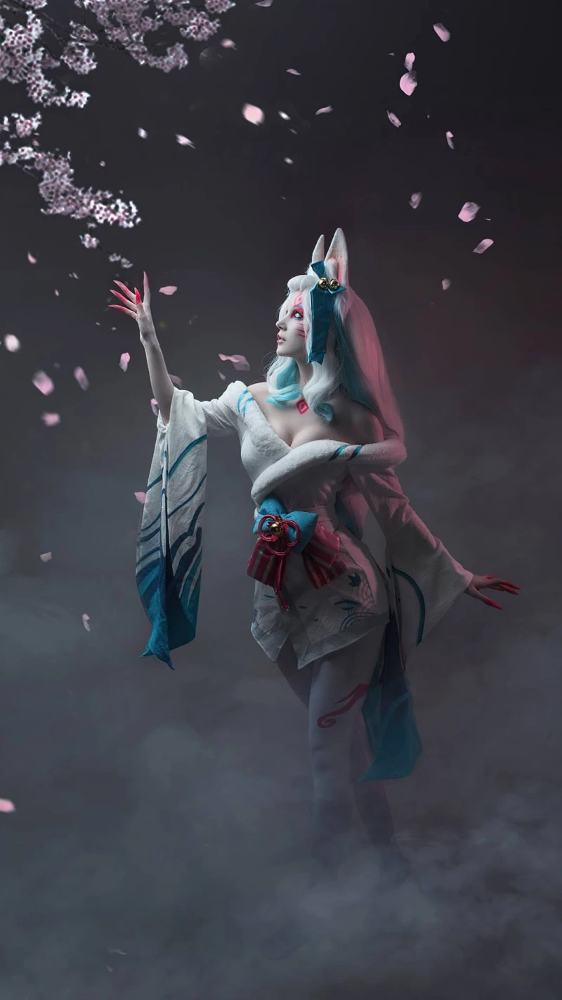 Cosplay: Kitsune in Sakura Bloom 4K Mobile Wallpaper