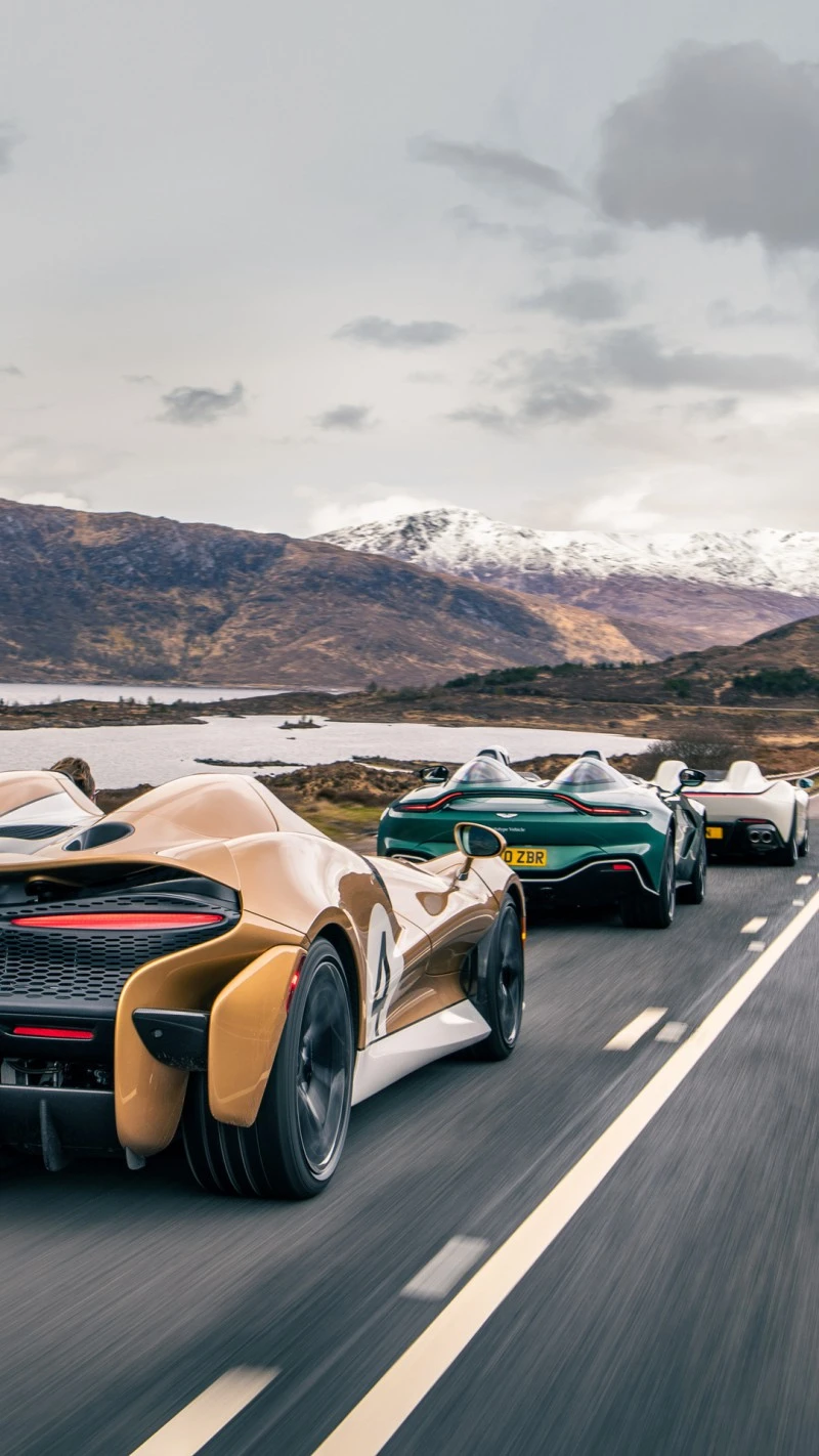 Supercars on a Scenic Drive 4K Mobile Wallpaper
