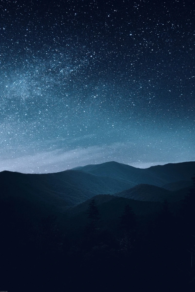Starry Night Over Mountain Range 4K Mobile Wallpaper