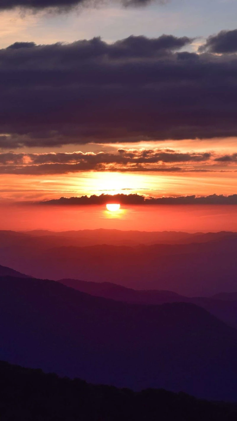 Sunset over Mountain Ranges 4K Mobile Wallpaper