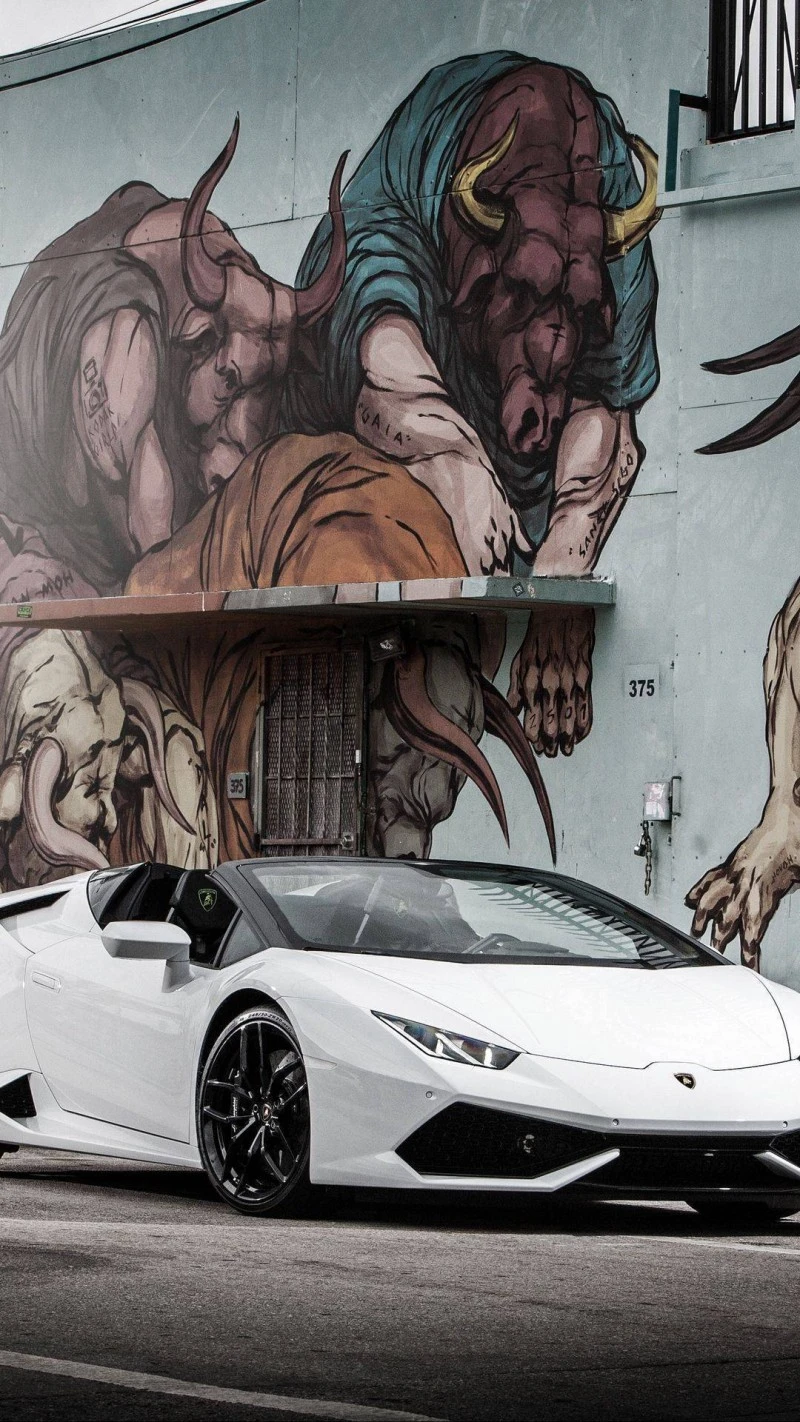 White Lamborghini Huracán Against Graffiti Art 4K Mobile Wallpaper