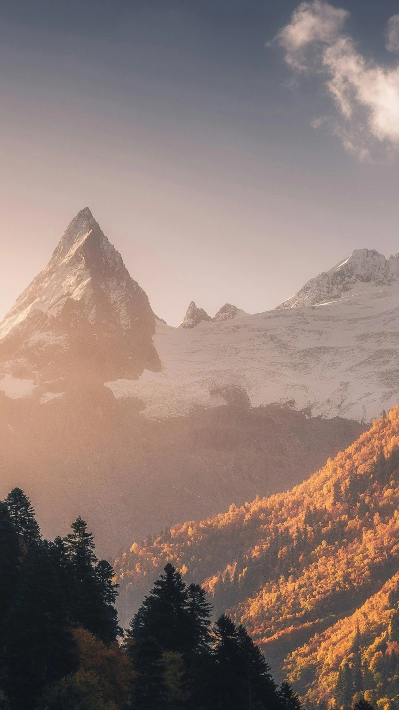 Snowy Mountain Range at Sunrise 4K Mobile Wallpaper