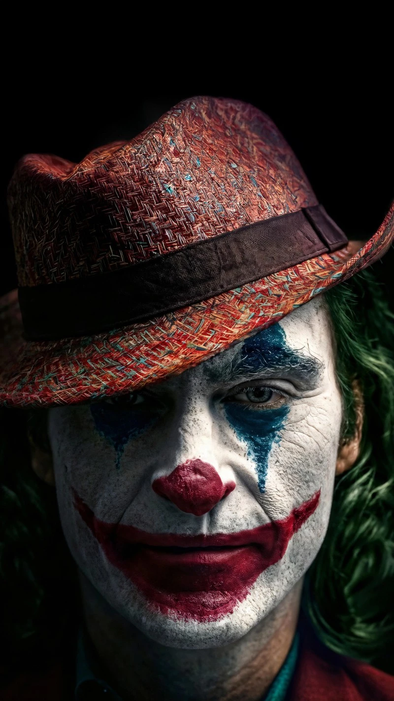 Joker's Twisted Smile 4K Mobile Wallpaper