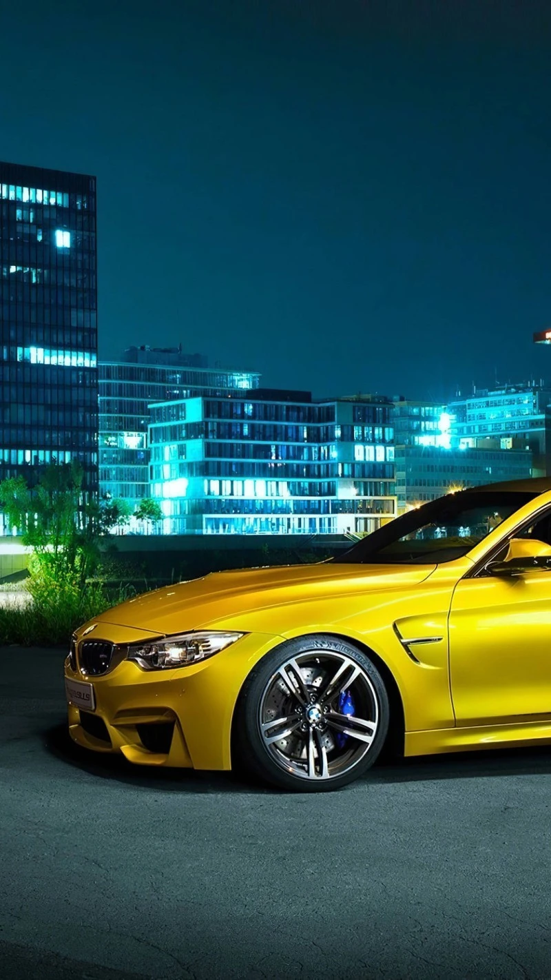 Yellow BMW M4 in the City 4K Mobile Wallpaper