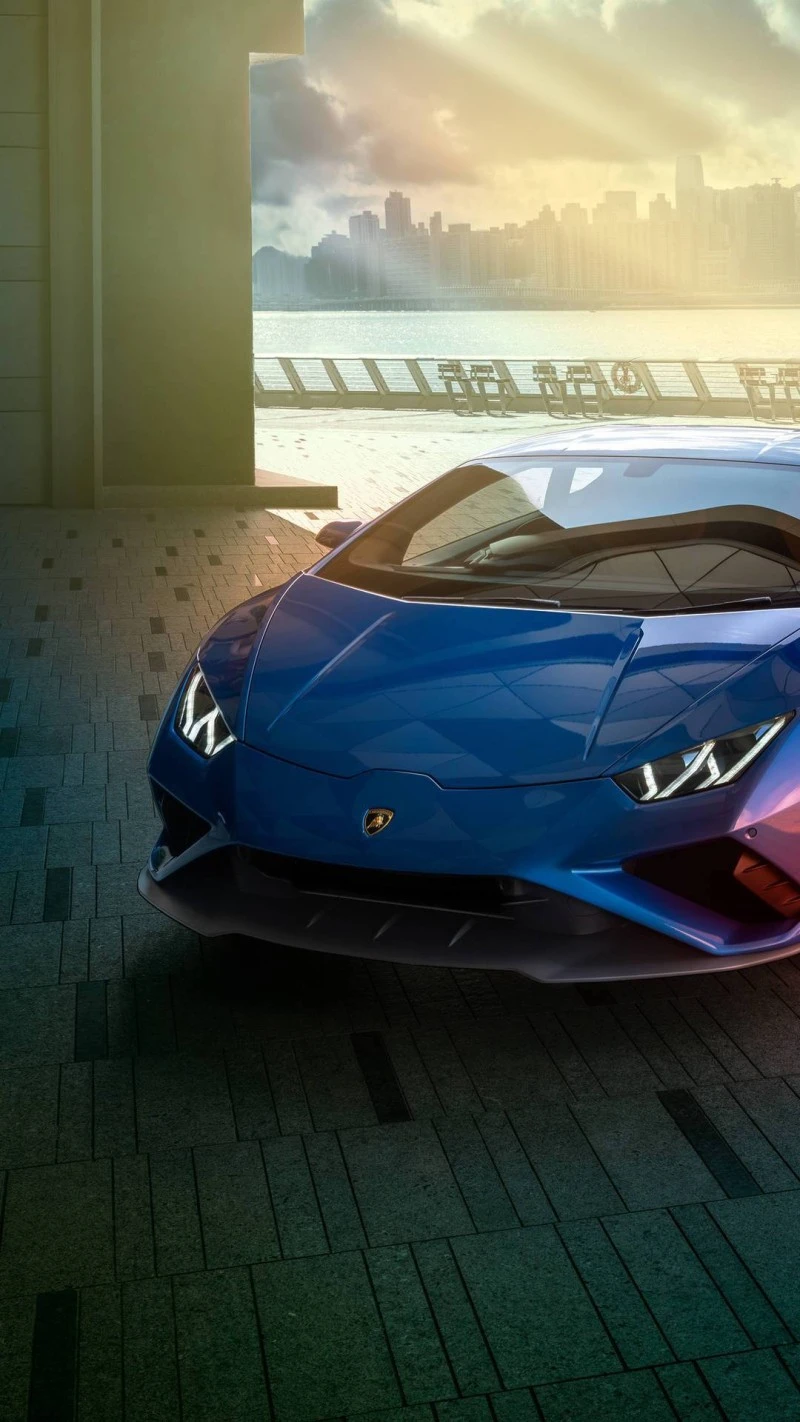 Blue Lamborghini Huracán Evo Cityscape 4K Mobile Wallpaper