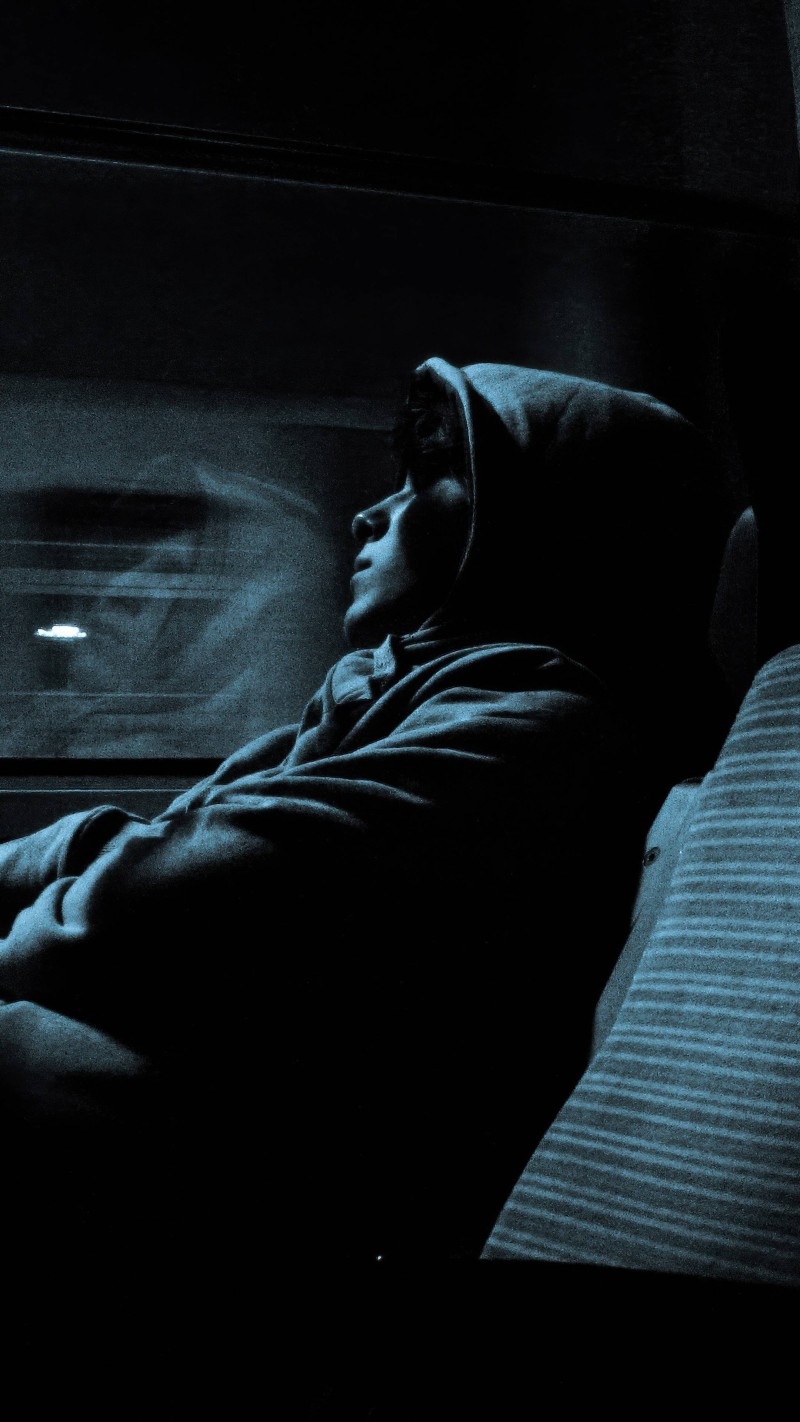 Moody Blue Hoodie Reflection 4K Thoughtful Wallpaper
