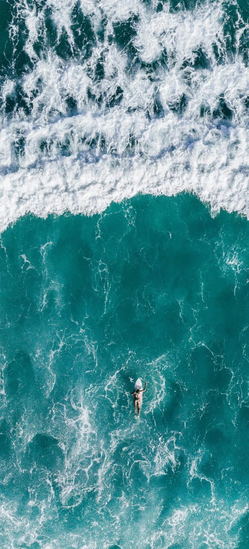 Aerial View of Surfer in the Ocean 4K Mobile Wallpaper