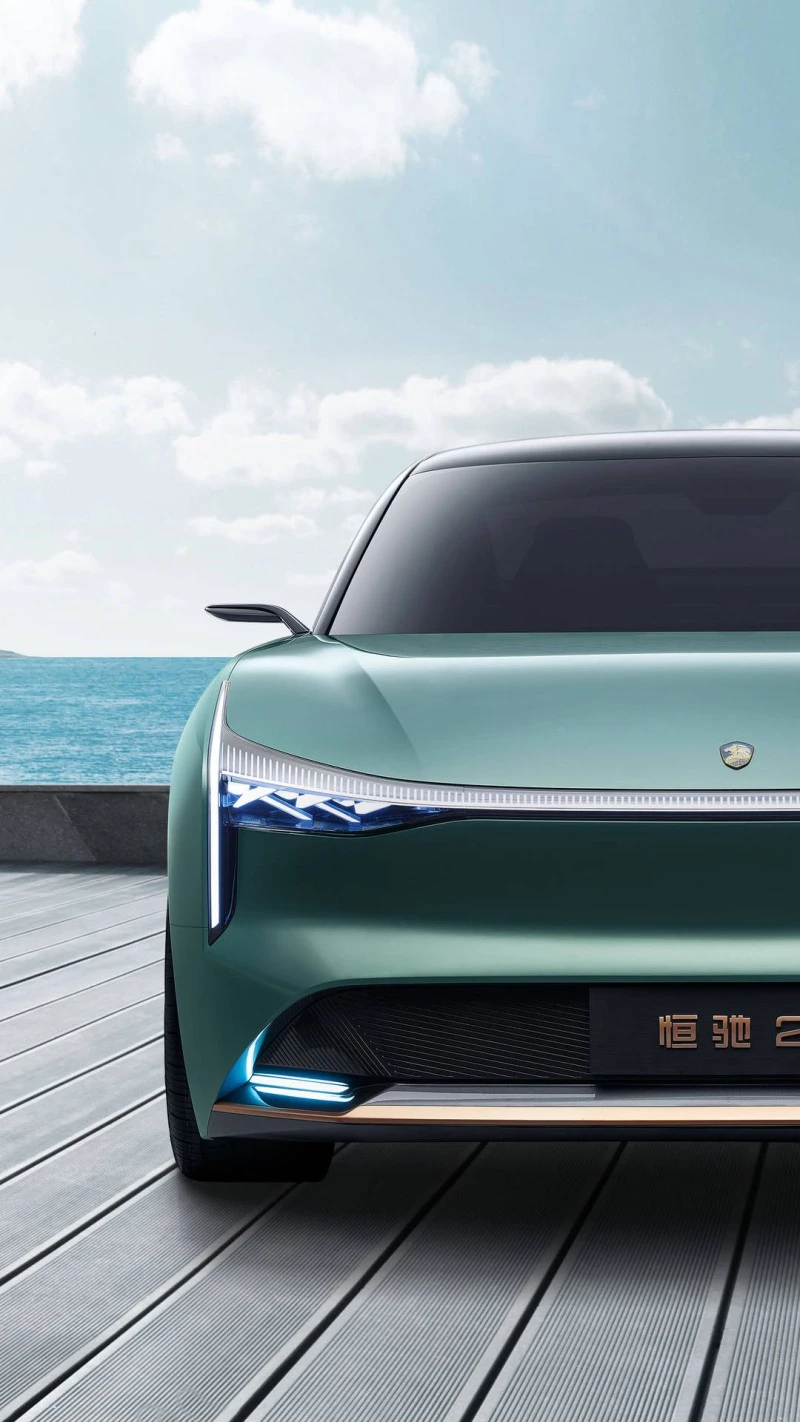 Luxury Electric Sedan by the Sea 4K Mobile Wallpaper