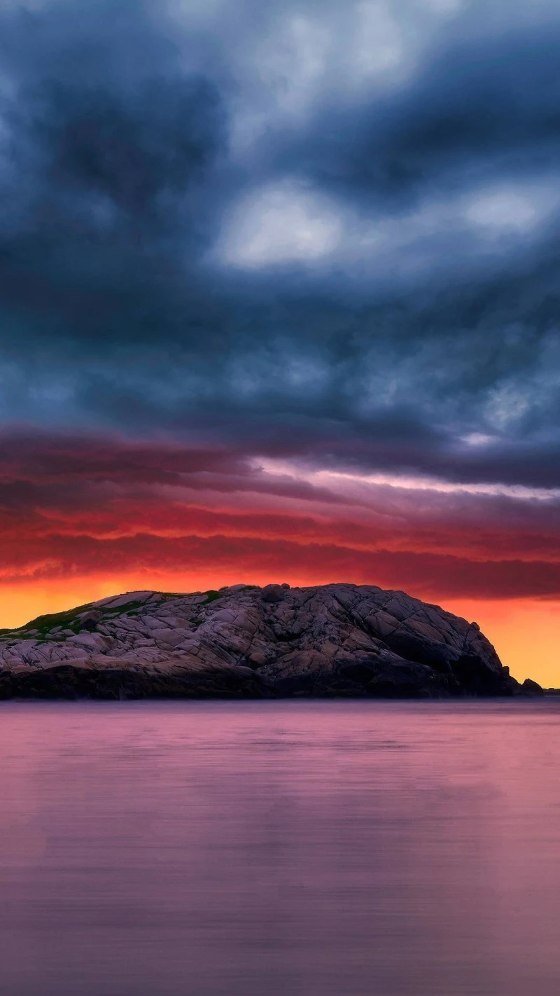 Dramatic Sunset over Island Rock 4K Mobile Wallpaper