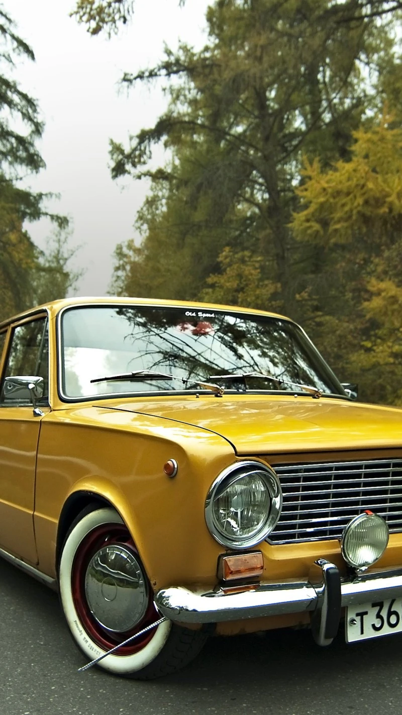 Vintage Yellow Lada in Autumn Forest 4K Mobile Wallpaper