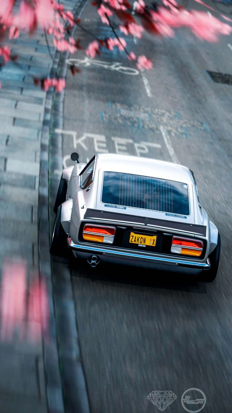 Datsun 240Z Cruising Under Cherry Blossoms 4K Mobile Wallpaper
