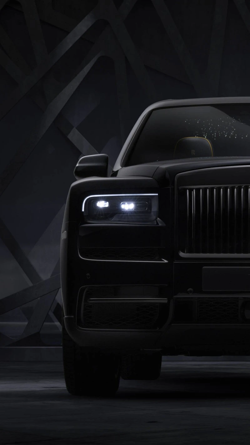 Rolls-Royce Ghost in Dramatic Lighting 4K Mobile Wallpaper