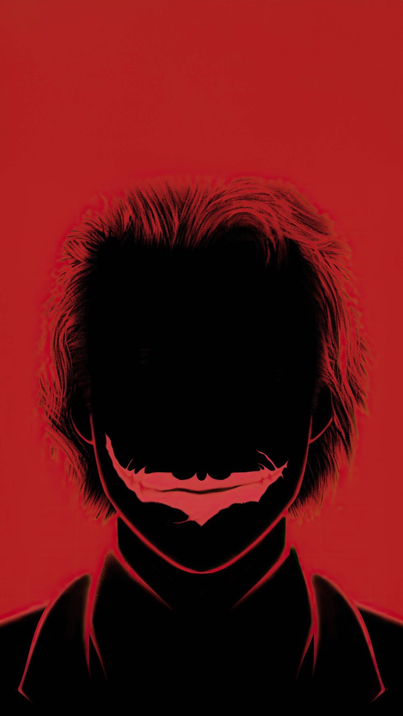 Joker's Sinister Smile 4K Mobile Wallpaper