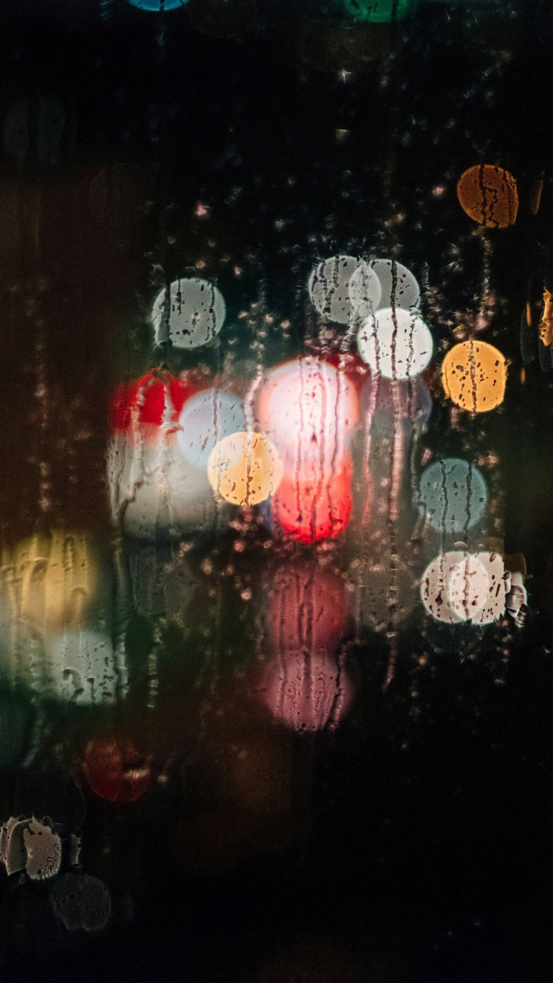 Rainy Window Bokeh City Lights 4K Wind Wallpaper