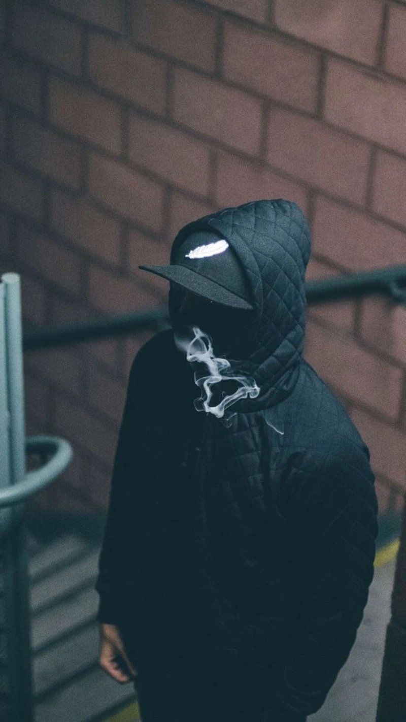 Mysterious Figure in the Shadows 4K Mobile Wallpaper