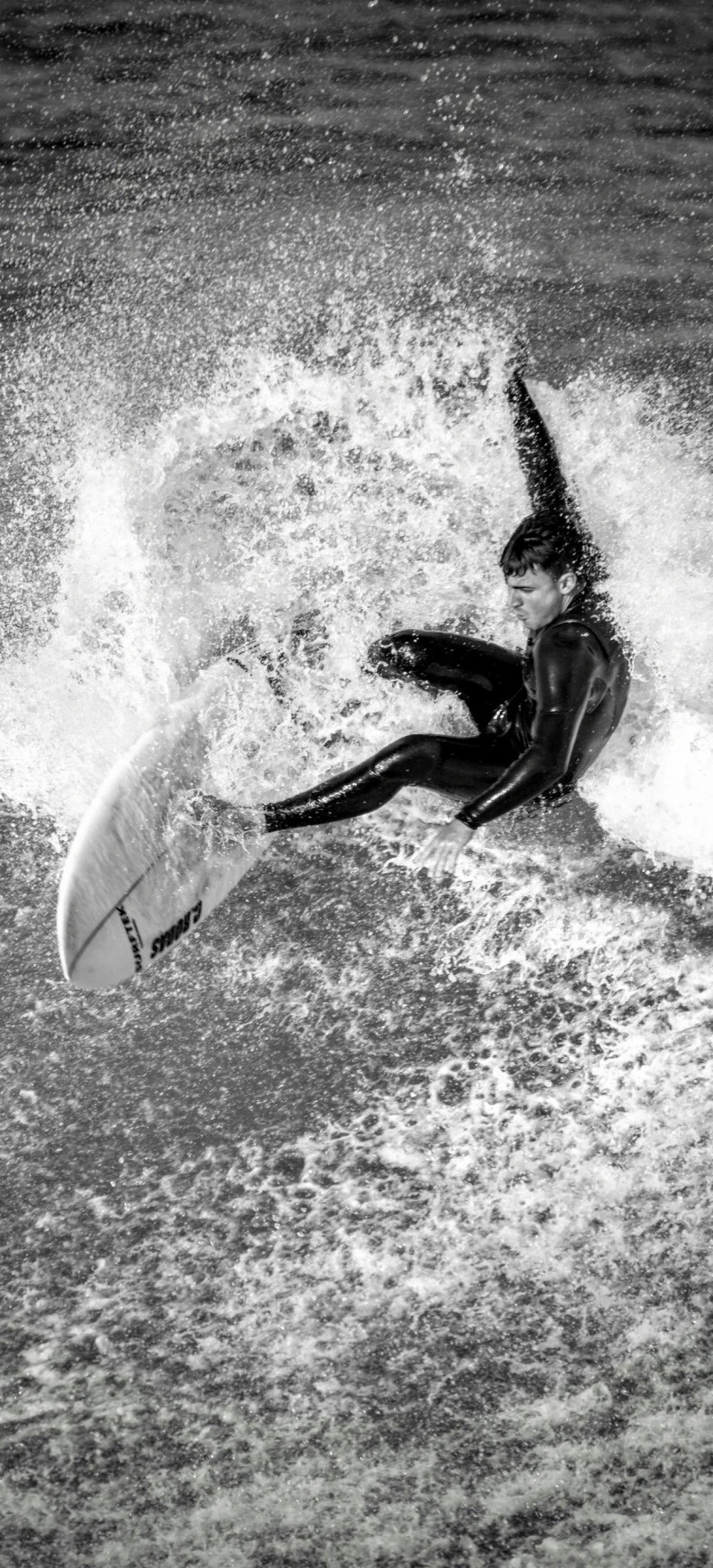 Surfer's Intense Action Shot 4K Mobile Wallpaper