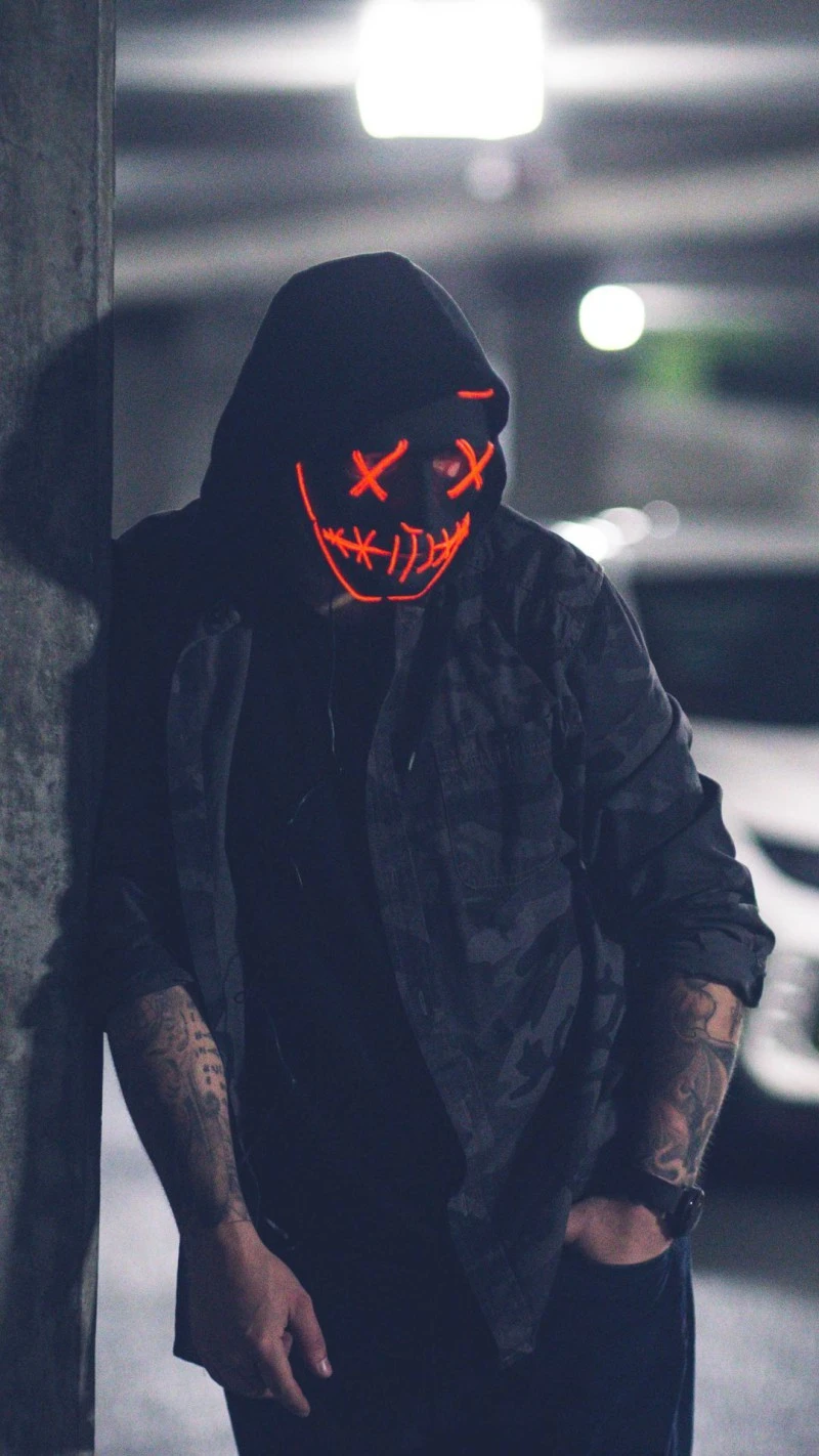 Mysterious Figure in Parking Garage 4K Mobile Wallpaper