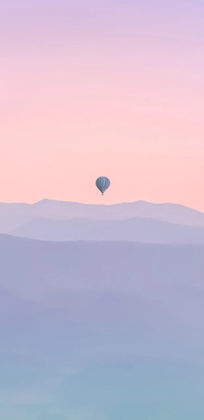 Hot Air Balloon Over Misty Mountains at Sunrise 4K Mobile Wallpaper
