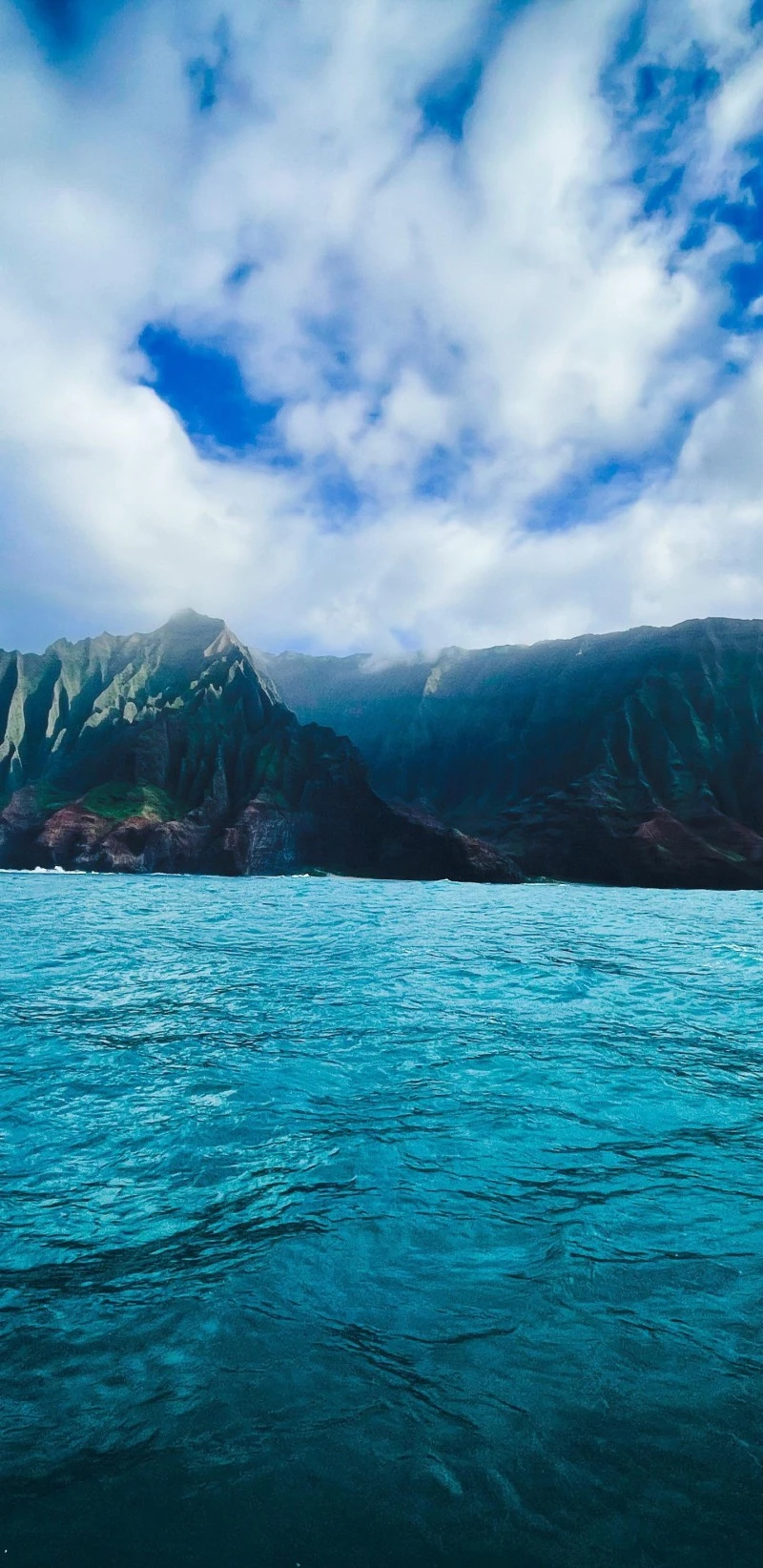 Ocean Vista with Mountain Backdrop 4K Mobile Wallpaper