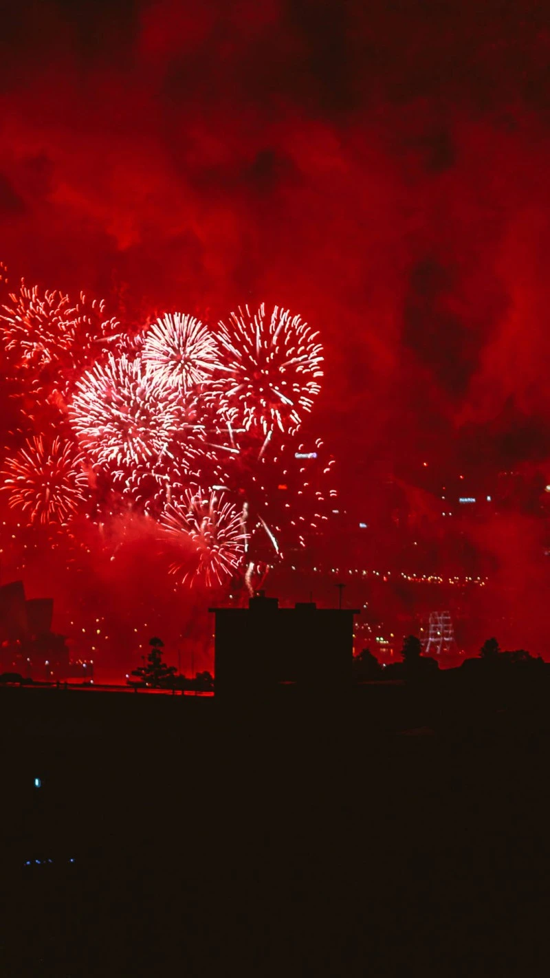 Red Fireworks Night Sky 4K Mobile Wallpaper