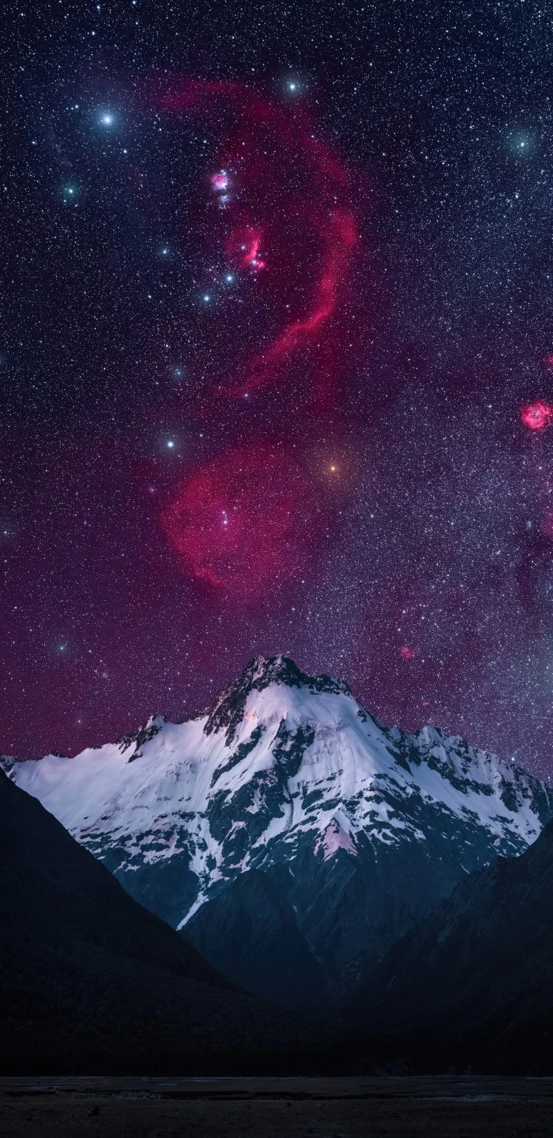 Cosmic Nebula over Snowy Peak 4K Mobile Wallpaper