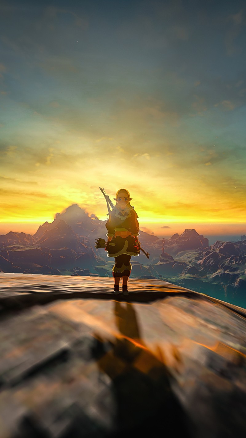 Vibrant Sunset Zelda Game Character Standing on Cliff Edge 4K Mobile Wallpaper