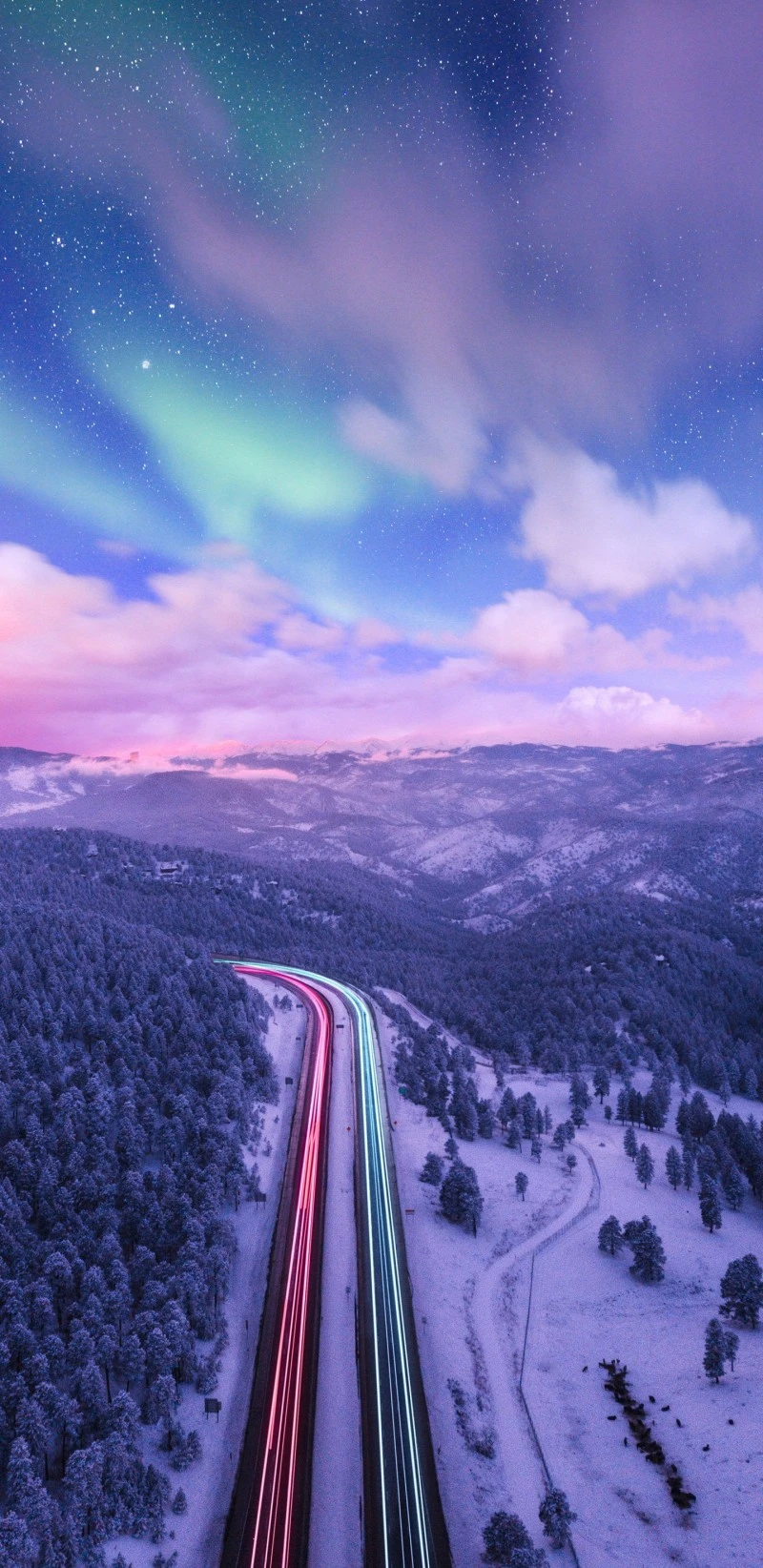Aurora Borealis over Snowy Highway 4K Mobile Wallpaper