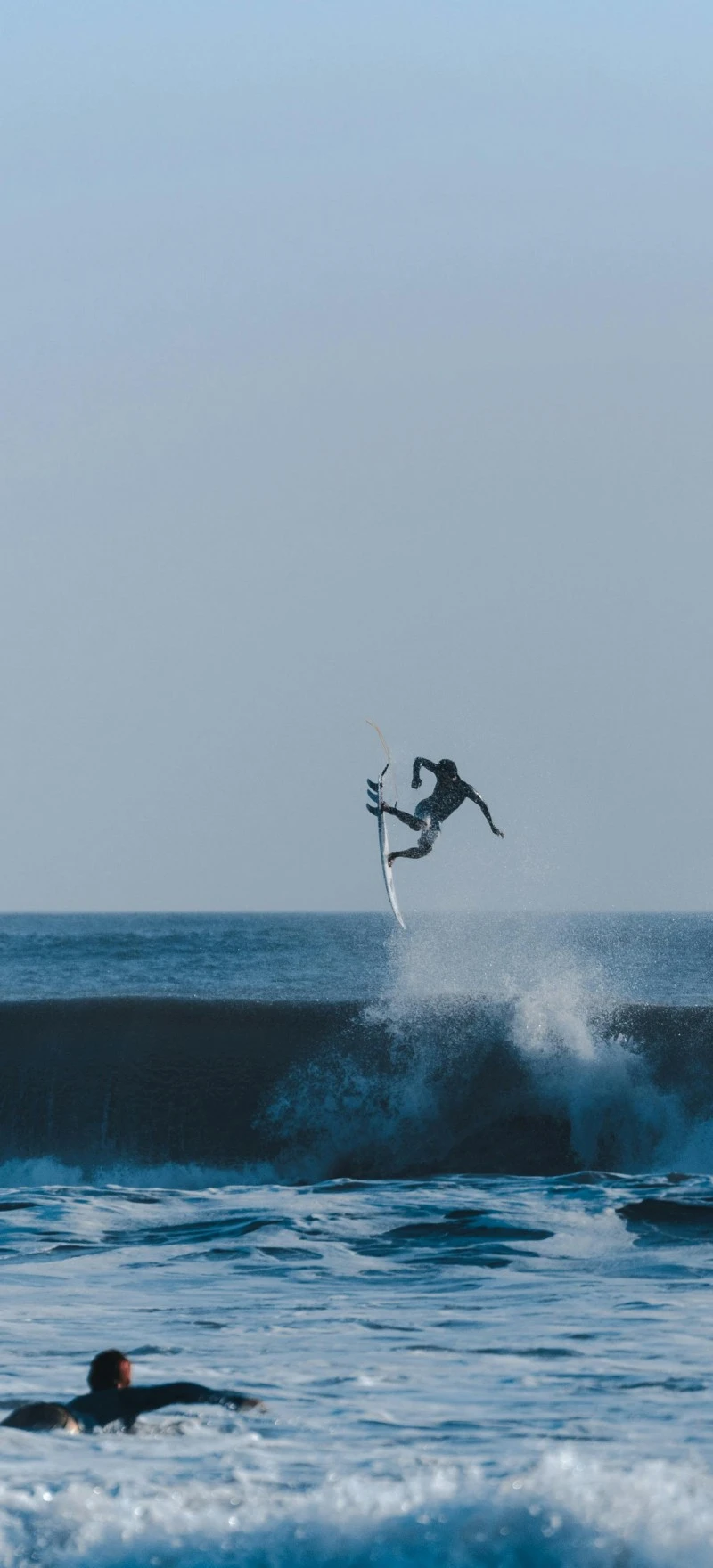 Surfer Airtime 4K Mobile Wallpaper