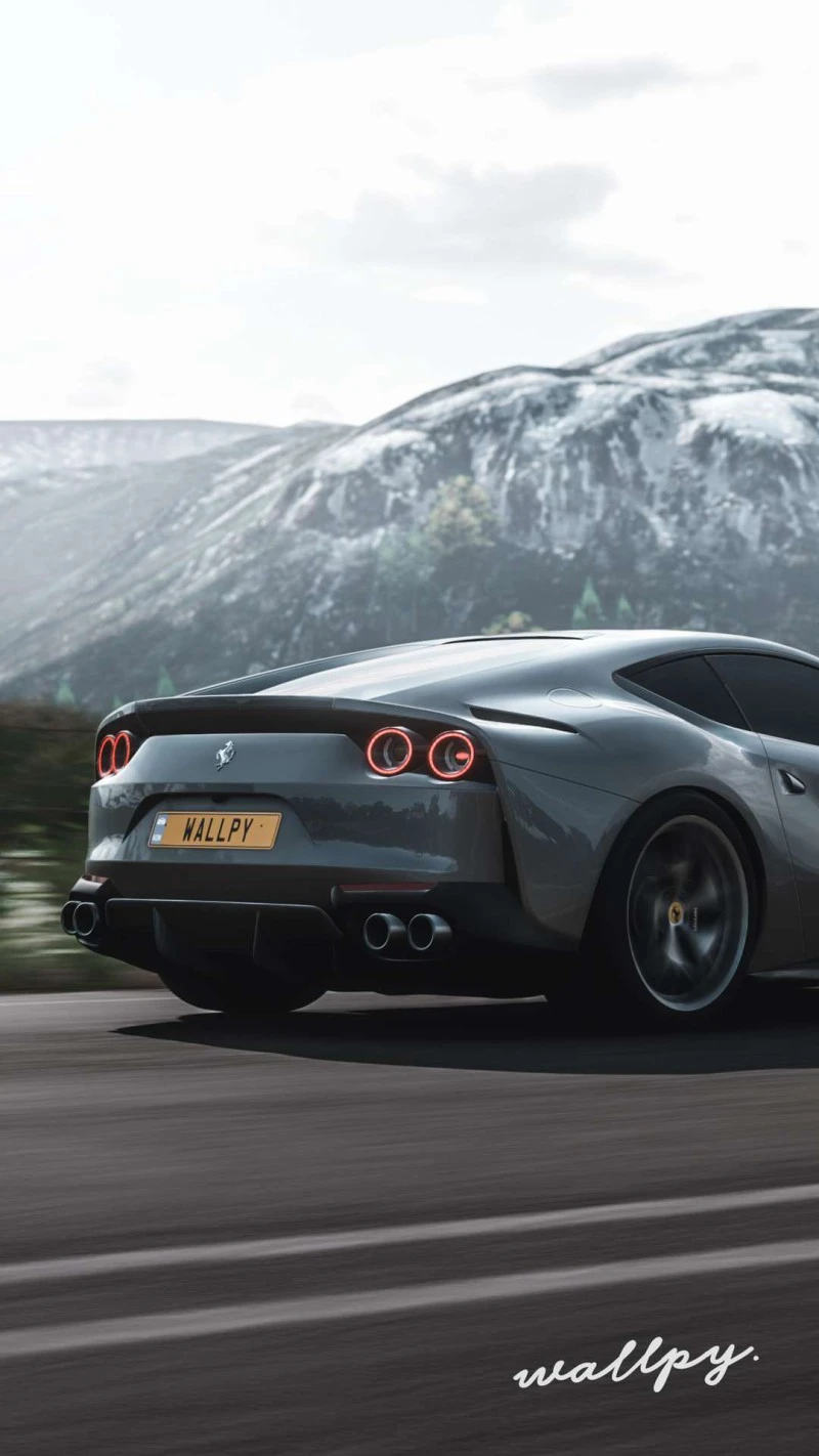 Ferrari on a Mountain Road 4K Mobile Wallpaper