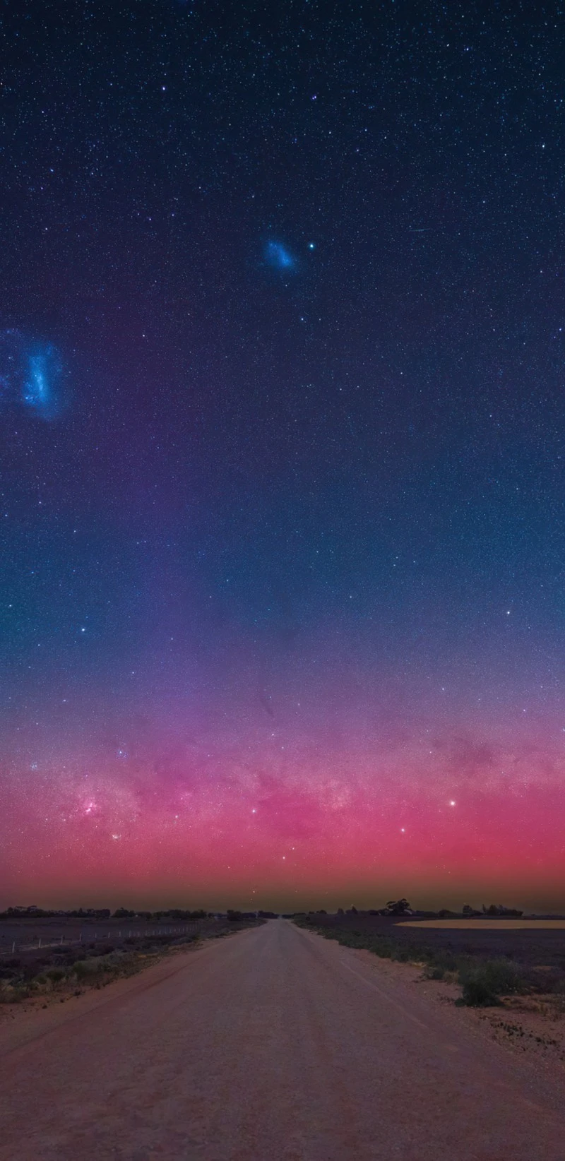Pink Aurora Australis over Country Road 4K Mobile Wallpaper