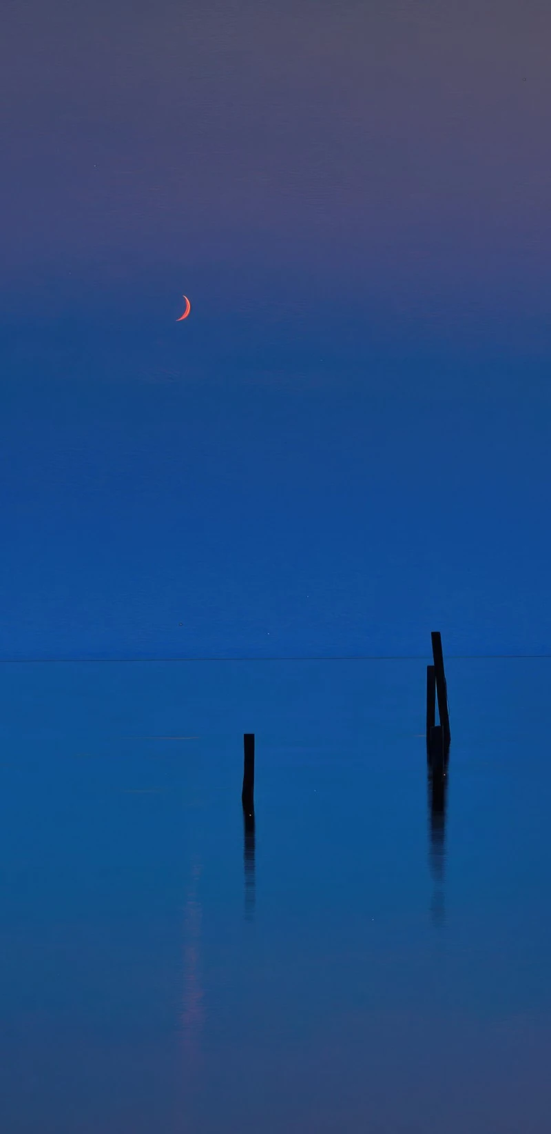 Crescent Moon over Still Water 4K Mobile Wallpaper
