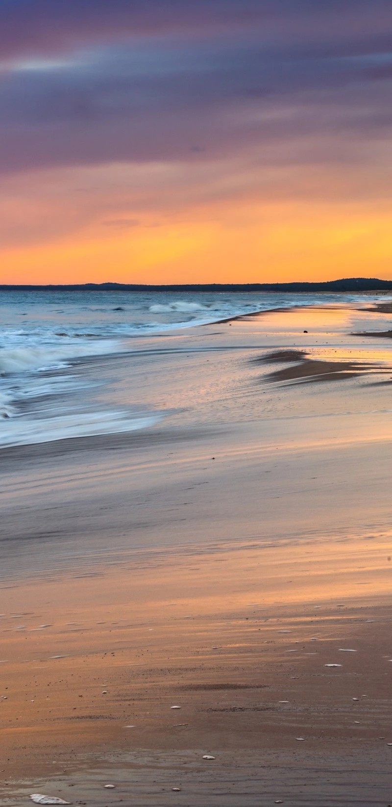 Serene Sunset Beach 4K Mobile Wallpaper