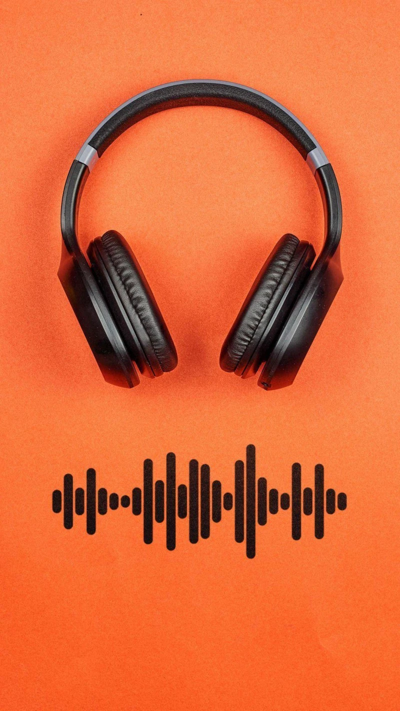 Black Headphones with Soundwave on Orange 4K Mobile Wallpaper