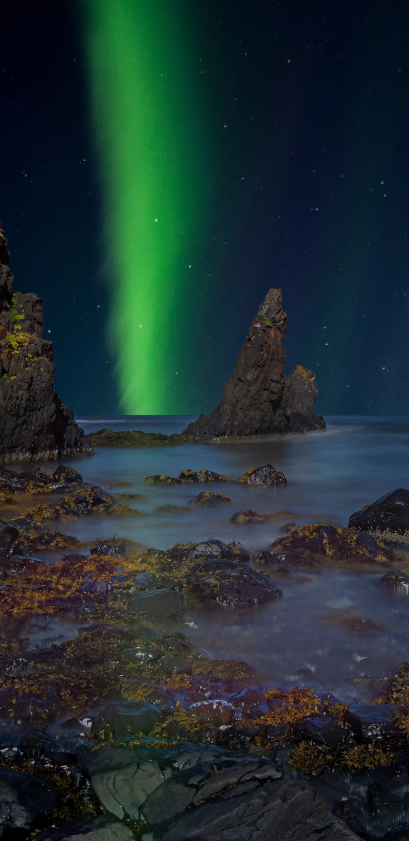 Northern Lights over Coastal Rocks 4K Mobile Wallpaper