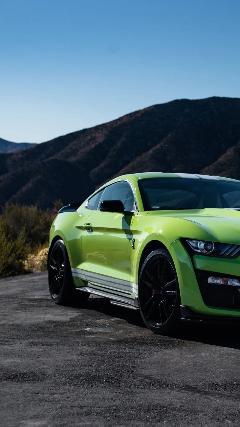 Green Mustang in the Mountains 4K Mobile Wallpaper