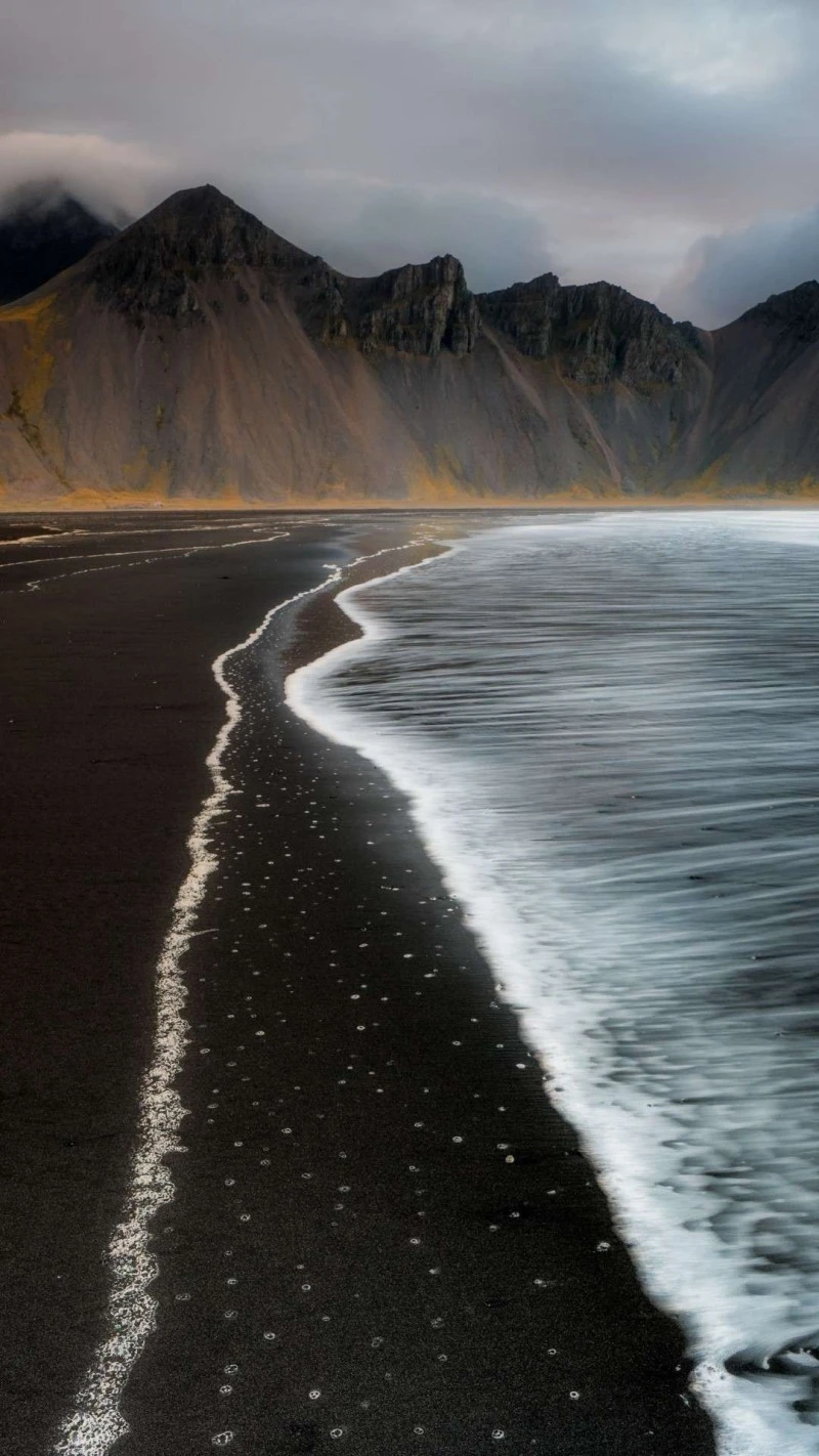 Black Sand Beach 4K Mobile Wallpaper