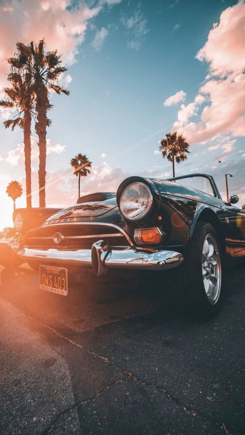 Black Convertible by the Beach 4K Mobile Wallpaper