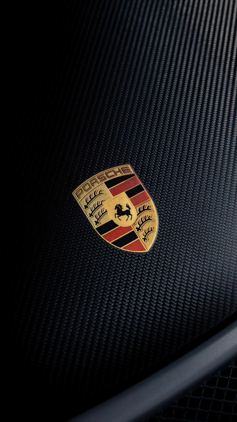 Porsche Crest on Carbon Fiber 4K Mobile Wallpaper