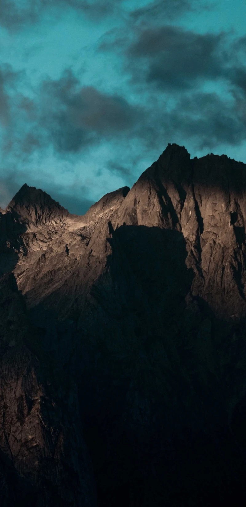 Rugged Mountain Peak at Dusk 4K Mobile Wallpaper