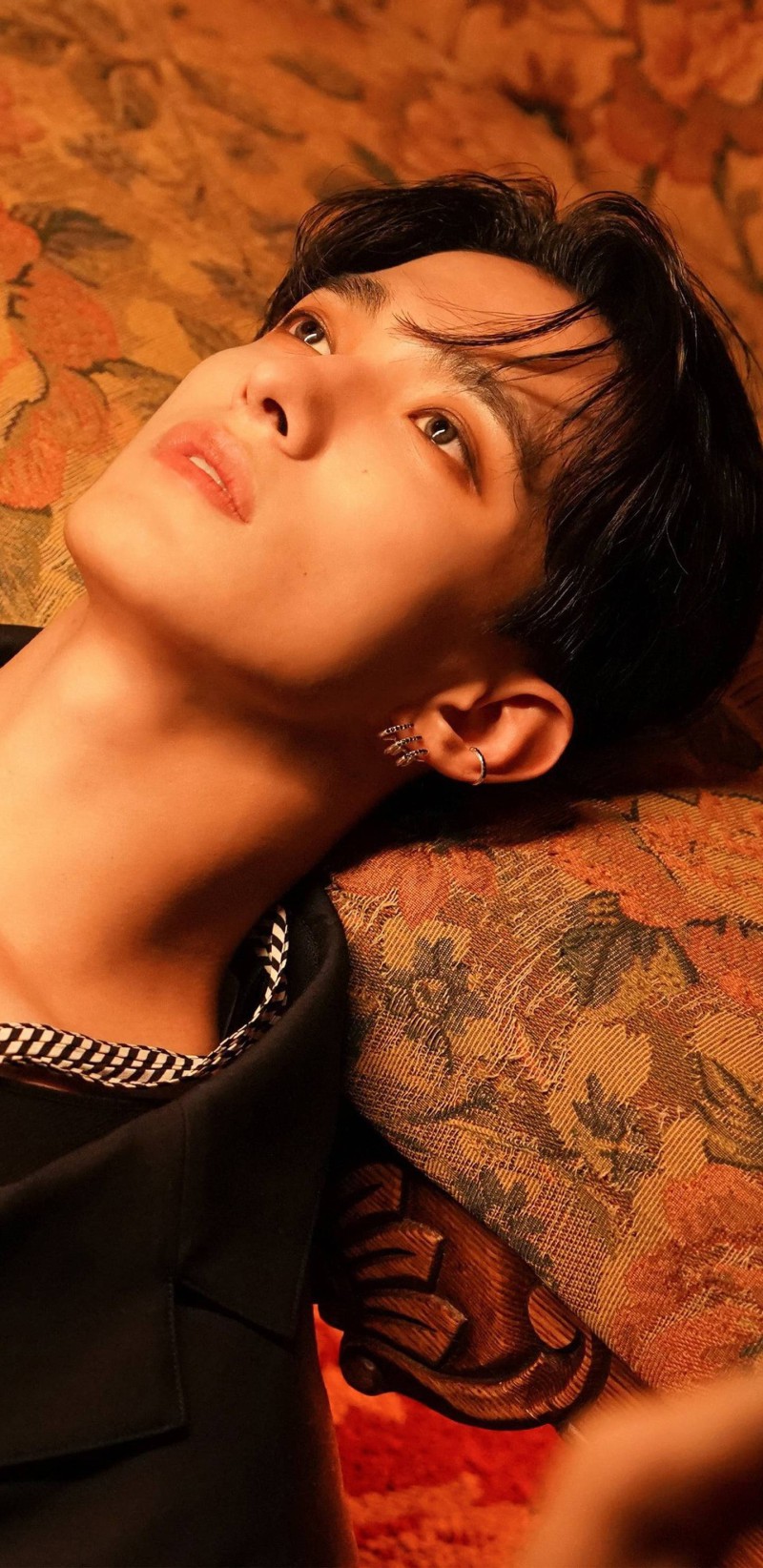 Mingyu Seventeen Pensive Look on Ornate Sofa Wallpaper 4K Event Wallpaper