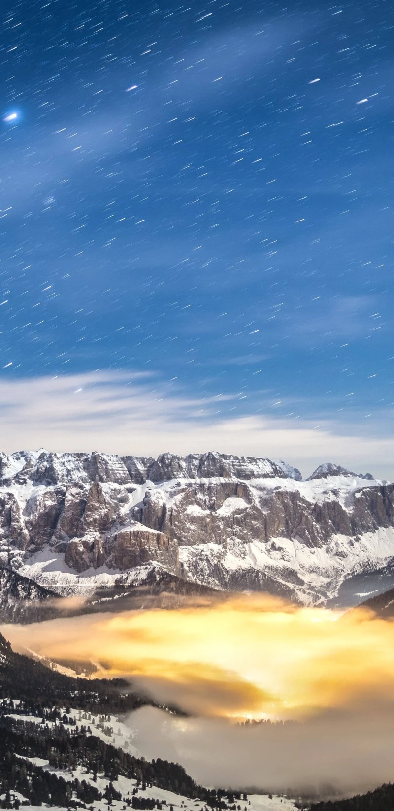 Star Trails Over Snowy Mountain Range 4K Mobile Wallpaper