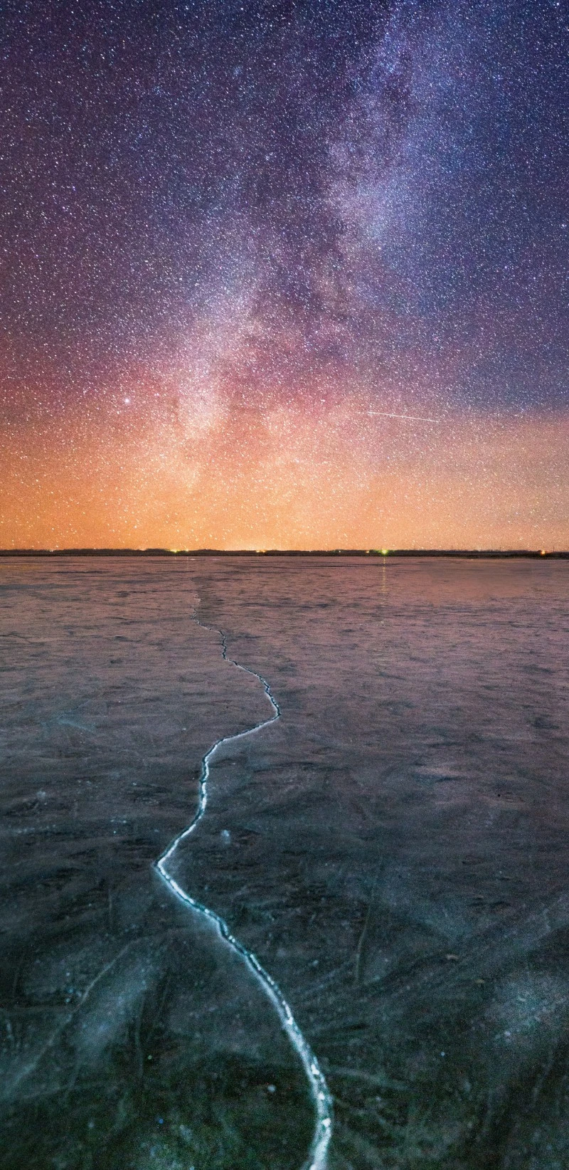 Starry Night over Frozen Lake 4K Mobile Wallpaper