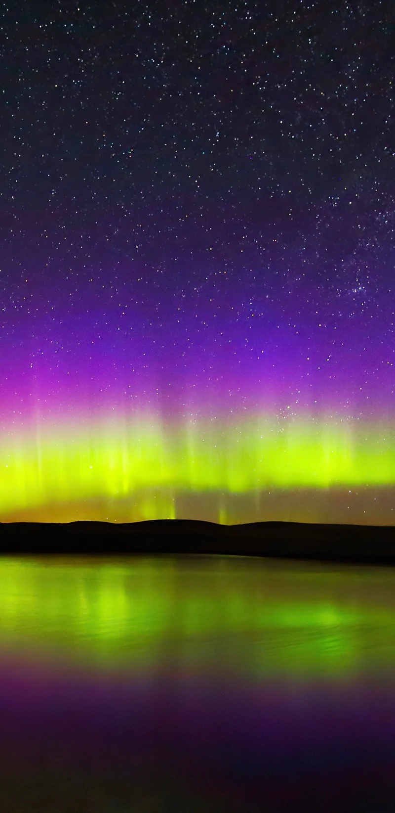 Aurora Borealis Over a Tranquil Lake 4K Mobile Wallpaper