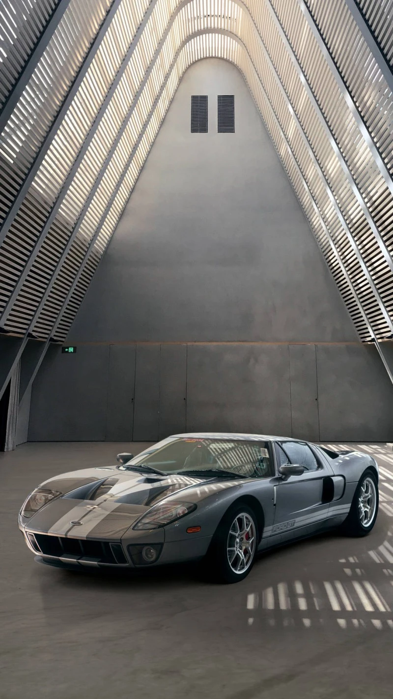 Ford GT in Modern Architectural Space 4K Mobile Wallpaper